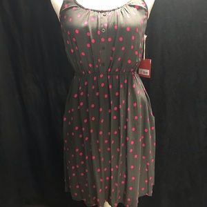 Grey and pink polka dot dress. Lace back,pockets.